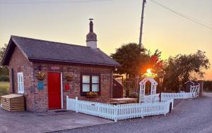 Solopgangen eller solnedgangen set fra lejligheden