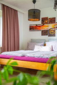 Ένα ή περισσότερα κρεβάτια σε δωμάτιο στο "Seeblick und mehr"