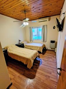 Ένα ή περισσότερα κρεβάτια σε δωμάτιο στο Hotel Ritz