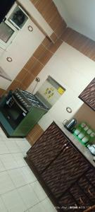 Kuchyň nebo kuchyňský kout v ubytování El Kelany Hotel