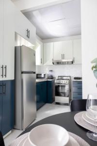 Η κουζίνα ή μικρή κουζίνα στο Prado Garden Hotel