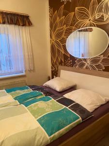 Ένα ή περισσότερα κρεβάτια σε δωμάτιο στο Bunte Stadt an der Elde 3