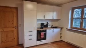 Kuchyň nebo kuchyňský kout v ubytování Ferienglück Allgäu Apartment Amelie