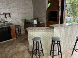 Φωτογραφία από το άλμπουμ του Seu refúgio em Joinville-Localização estratégica σε Joinville