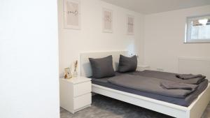 En eller flere senge i et værelse på Casa Mia