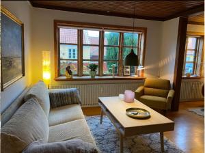 Posezení v ubytování GBH - Central Townhouse in Skagen + 9 fotografií