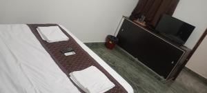 TV a/nebo společenská místnost v ubytování Shree chendur family Residency + 10 fotografií