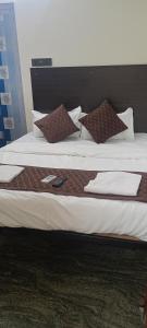 Postel nebo postele na pokoji v ubytování Shree chendur family Residency