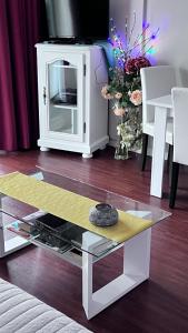 TV a/nebo společenská místnost v ubytování Appart - Rés du Parc- Hardelot