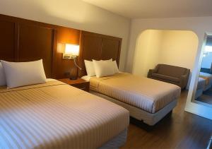 Postel nebo postele na pokoji v ubytování Valley Inn