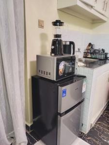 Nhà bếp/bếp nhỏ tại Cozy Homes