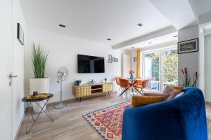 TV a/nebo společenská místnost v ubytování COZY APARTMENT IN BRUSSELS