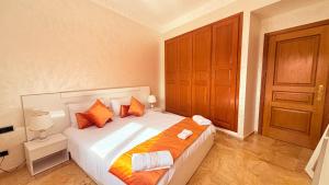 Ένα ή περισσότερα κρεβάτια σε δωμάτιο στο Heart of Marrakech Chic & Central Gueliz Apartment - Free parking