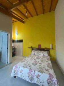 En eller flere senge i et værelse på Flor da Ilha