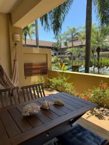 Сад в Residências Garcez - Pantai Enseada - Vista Mar