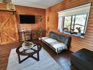 TV/trung tâm giải trí tại Cabañas Torre Huillinco