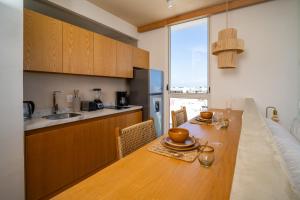 Kuchyň nebo kuchyňský kout v ubytování Greta Puerto Morelos