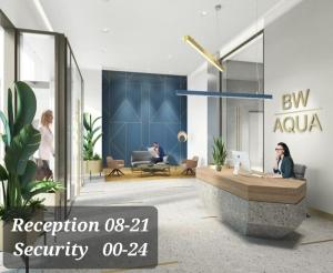 a rendering of a lobby with two people working on their computers at GIGI Apartment in Belgrade