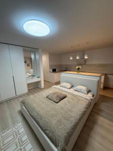 Giường trong phòng chung tại Compleks by Karlus +7 ảnh