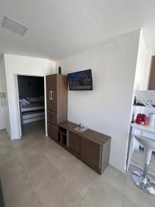 TV a/nebo společenská místnost v ubytování Mirador XV, Mar del Plata