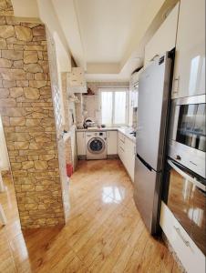 Kuchyň nebo kuchyňský kout v ubytování 7 min to beach luxury apartment Dar Bouazza + 11 fotografií