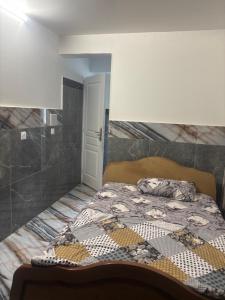 Postel nebo postele na pokoji v ubytování Rent a studio + 3 fotografie