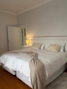 Postel nebo postele na pokoji v ubytování Zara Vineta Swakopmund