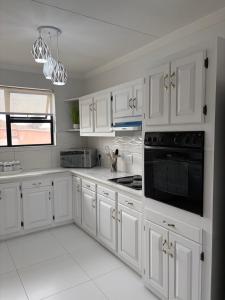 Kuchyň nebo kuchyňský kout v ubytování Zara Vineta Swakopmund