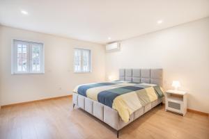 Postel nebo postele na pokoji v ubytování A Casa da Sara