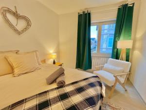 Ένα ή περισσότερα κρεβάτια σε δωμάτιο στο Refuge Douillet - Esprit Alsacien