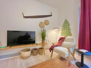 Μια τηλεόραση ή/και κέντρο ψυχαγωγίας στο Refuge Douillet - Esprit Alsacien