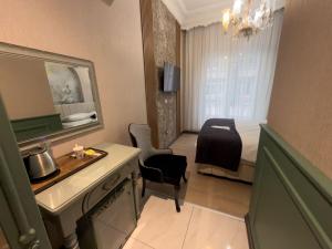 SteelOtel في قيصري: غرفة الفندق مع مطبخ وغرفة نوم