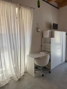 Η κουζίνα ή μικρή κουζίνα στο Sole Room +2 φωτογραφίες