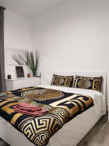 Ένα ή περισσότερα κρεβάτια σε δωμάτιο στο Casa ALFRED FIDENZA