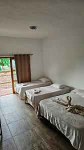 En eller flere senge i et værelse på Pousada Canto Da Ribeira + 100 billeder