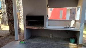 a kitchen with a counter top and a sink at Okin 22 La Reserva in Costa del Este