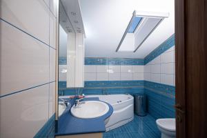 Koupelna v ubytování Casa Herneacova- Oaza de liniste