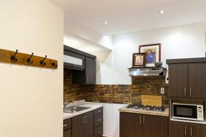 Kuchyň nebo kuchyňský kout v ubytování The Loft in San Juan + 12 fotografií