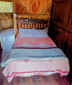 Postel nebo postele na pokoji v ubytování hospedaje rural finca cafetera La Maloka