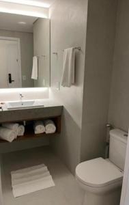 Et badeværelse på porto2life resort