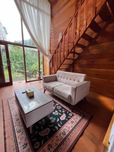 Et opholdsområde på Cabin Hillside Dieng