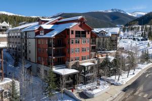 an aerial view of a resort in the snow at Ski-In / Ski-Out 1 Bedroom Condo base of WP Resort in Winter Park