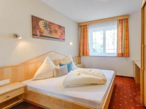 Postel nebo postele na pokoji v ubytování Apartment in Tyrol in an attractive area