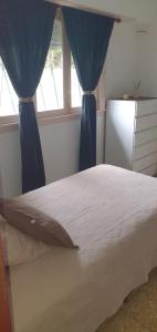 Ένα ή περισσότερα κρεβάτια σε δωμάτιο στο Casa Mar Azul