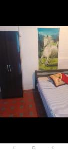 Postel nebo postele na pokoji v ubytování Milonga