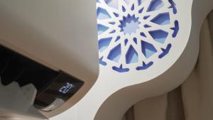 a snowflake pattern on the side of a car at Dar Ouadie Serene Blue in Chefchaouen
