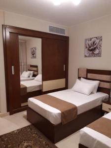 Postel nebo postele na pokoji v ubytování Mangarove m3 1c 11