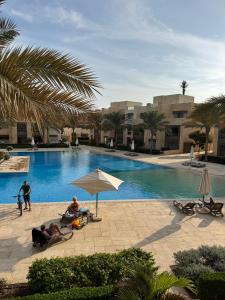 Bazén v ubytování Mangarove m3 1c 11 nebo v jeho okolí