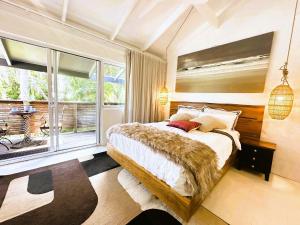 En eller flere senge i et værelse på 2-12 Hill Street Sunshine Beach