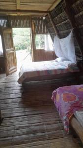 Postel nebo postele na pokoji v ubytování Amanecer mágico, Putumayo